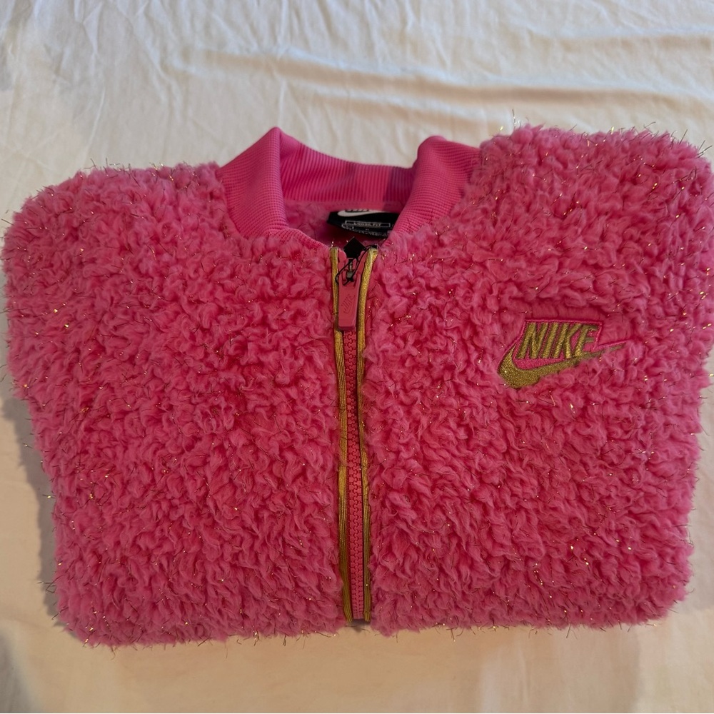 Hot Pink Nike Zip Up Jacket with Gold Accents.